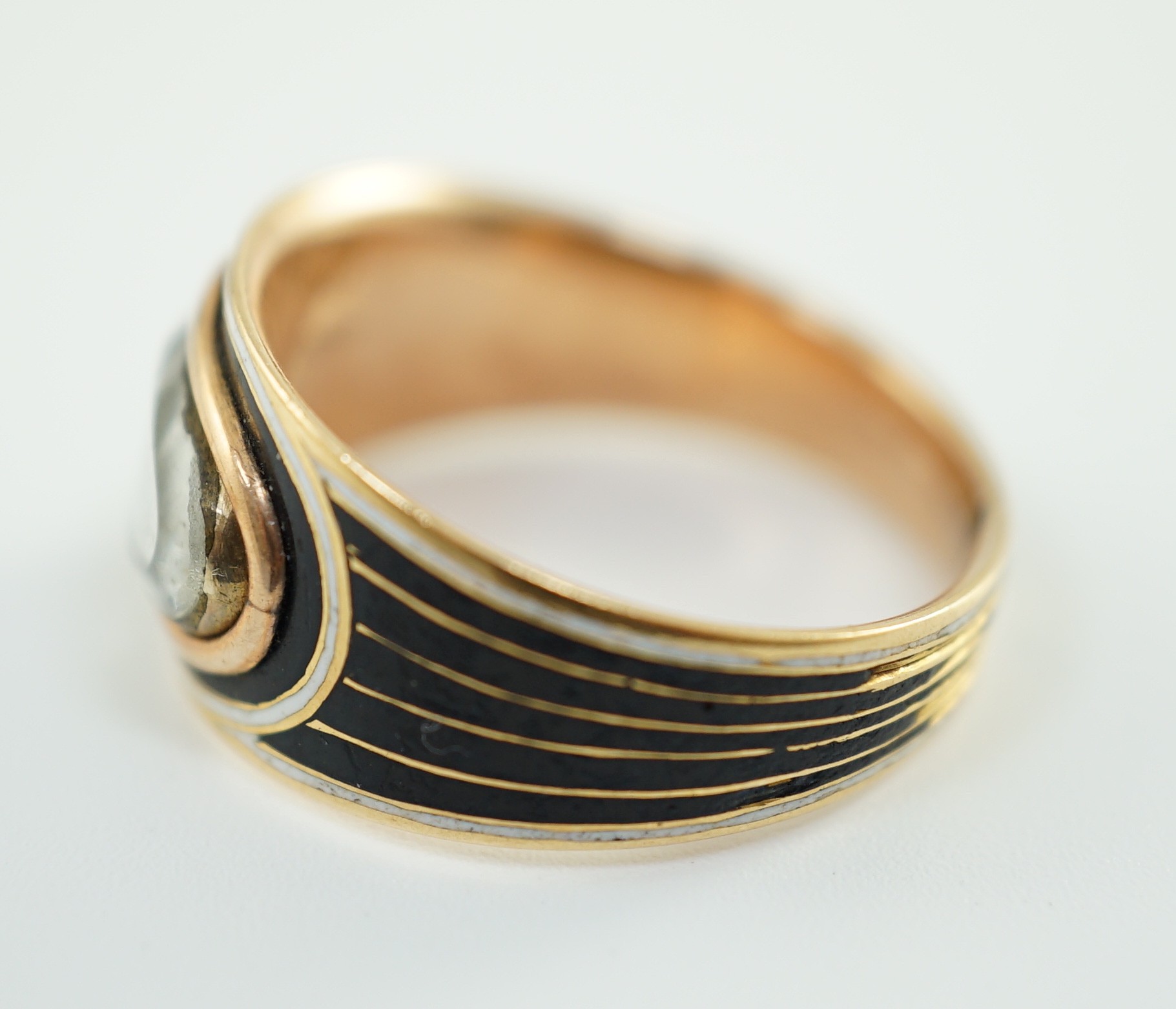 A George IV gold and two colour enamel mourning ring